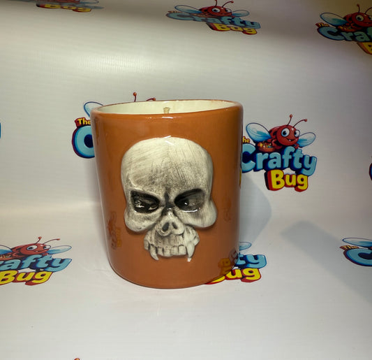 Ceramic skull vessel candle