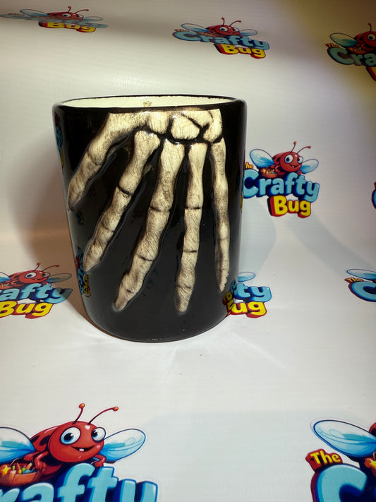 Cermic skellington hand vessel candle